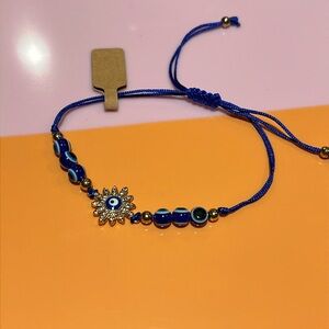 Sun Shape Evil Eye adjustable bracelet NIP